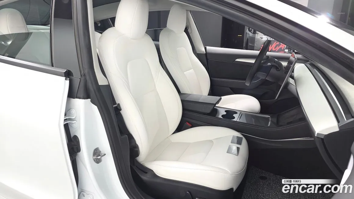 Tesla Model 3 — фото 10