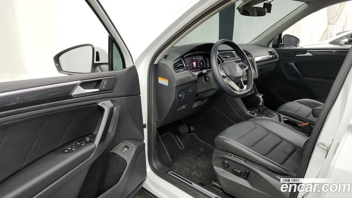 Volkswagen Tiguan — фото 10