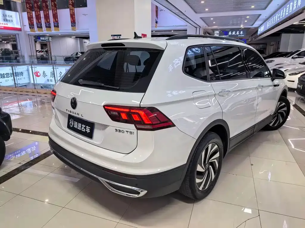 Volkswagen Tiguan L — фото 5