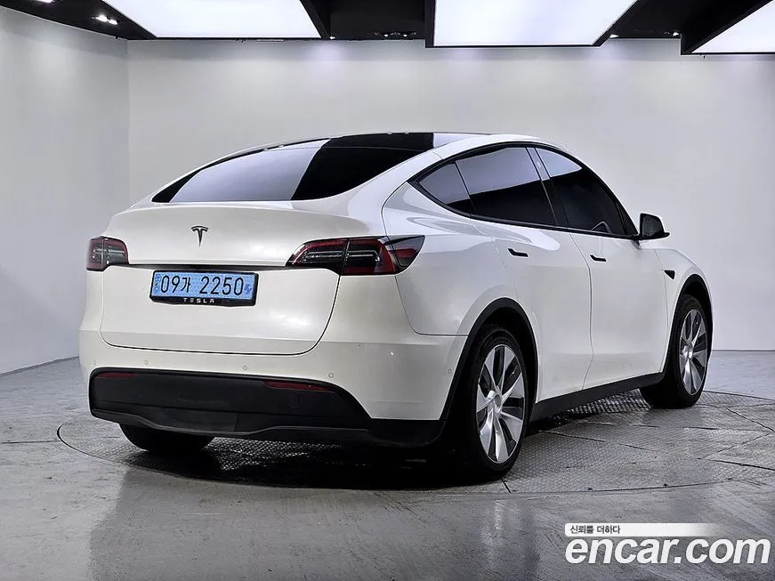 Tesla Model Y — фото 4