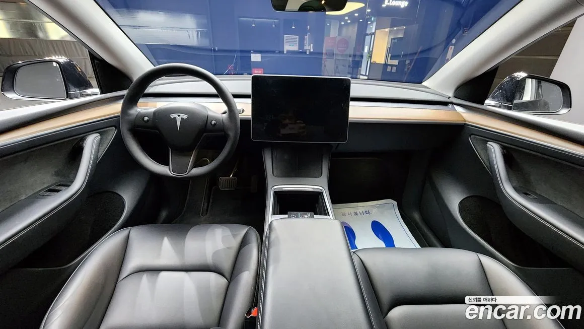 Tesla Model Y — фото 7