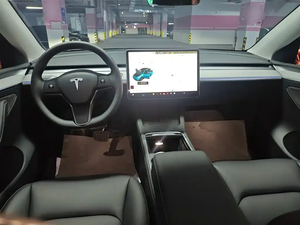 Tesla Model Y — фото 10