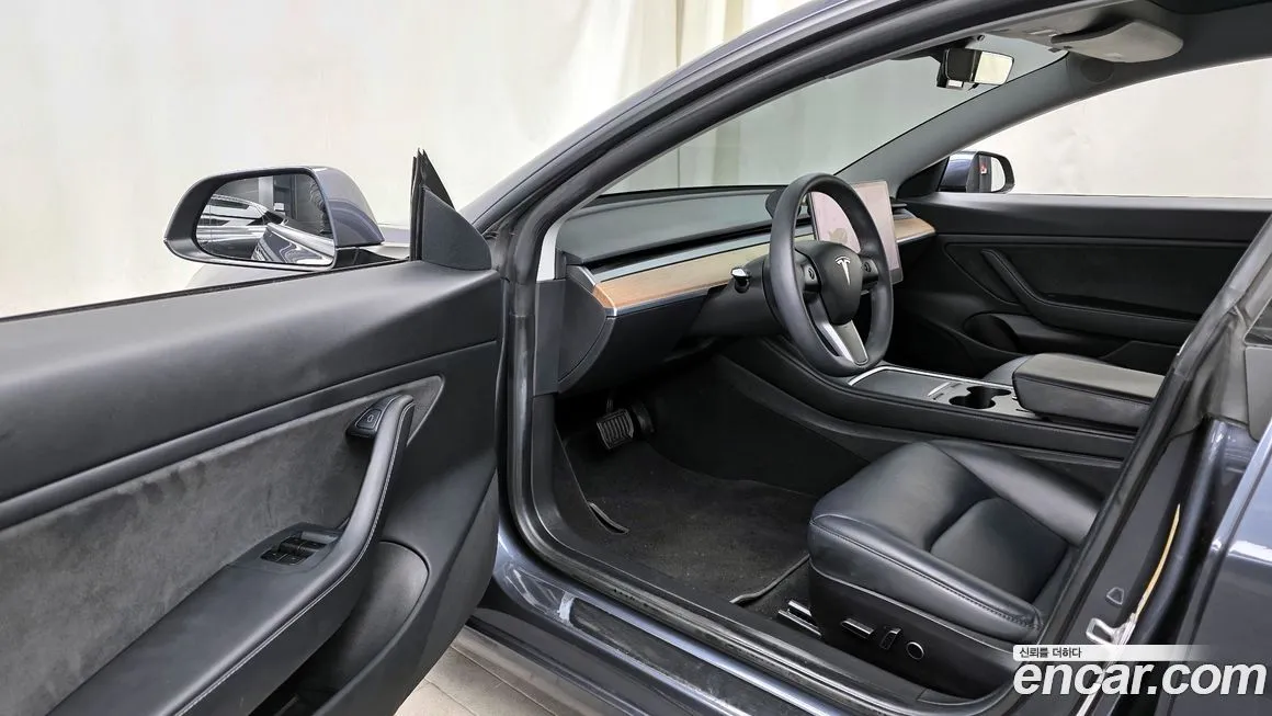 Tesla Model 3 — фото 10