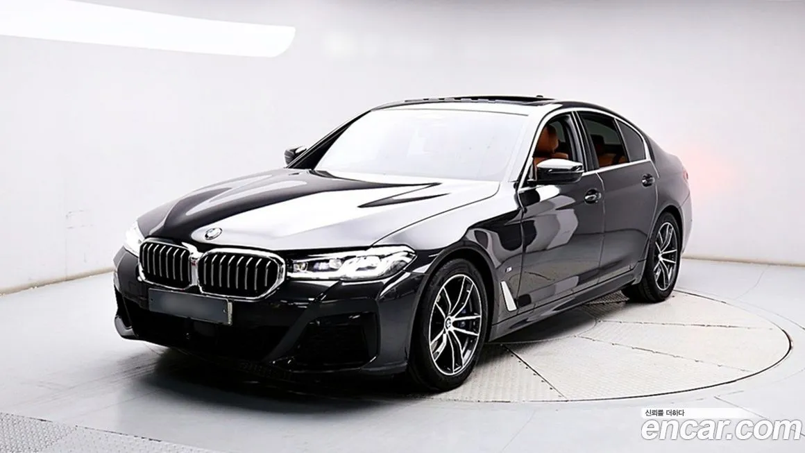 BMW 5-Series — фото 1