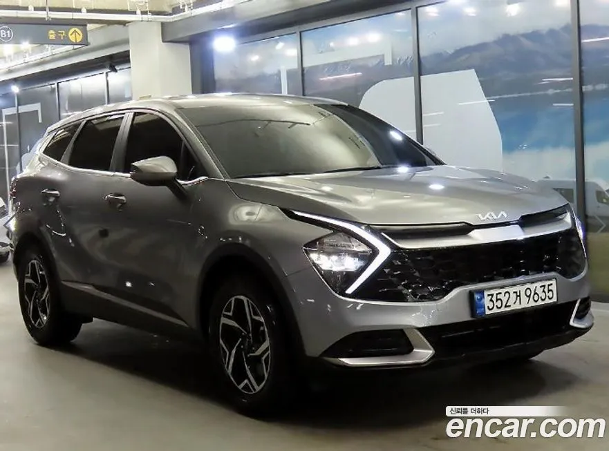 Kia Sportage — фото 1