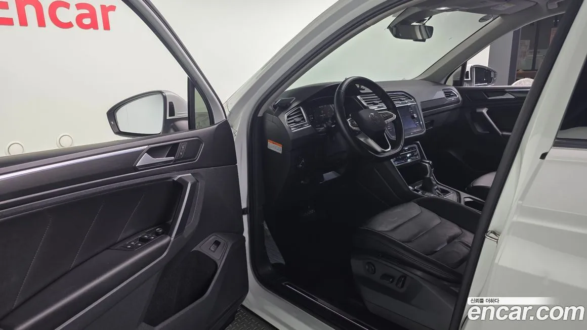 Volkswagen Tiguan — фото 10