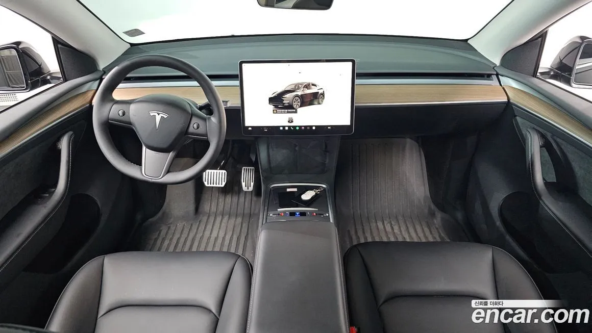 Tesla Model Y — фото 7