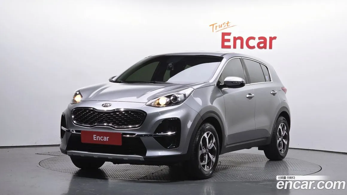 Kia Sportage — фото 1