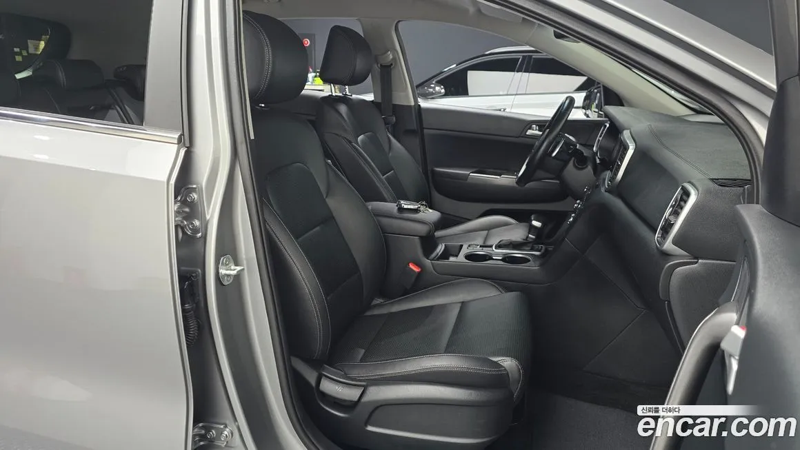 Kia Sportage — фото 10