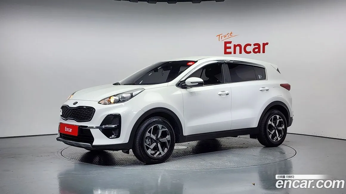 Kia Sportage — фото 1