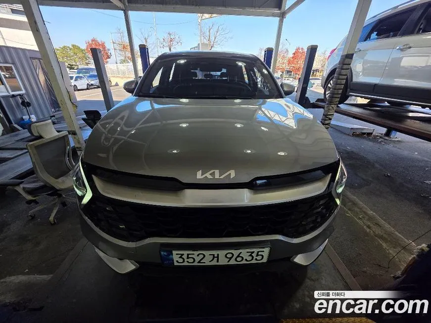 Kia Sportage — фото 1