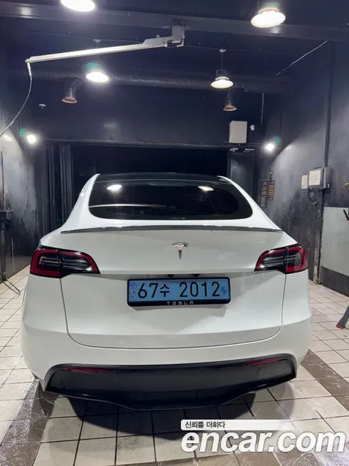 Tesla Model Y — фото 1