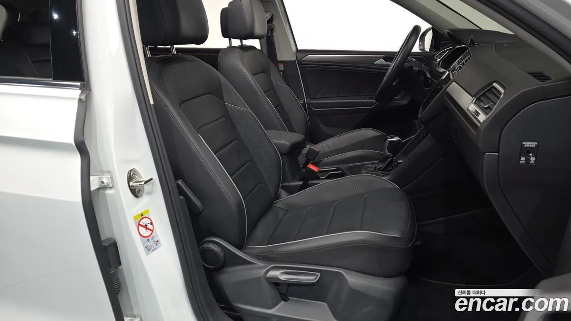 Volkswagen Tiguan — фото 10