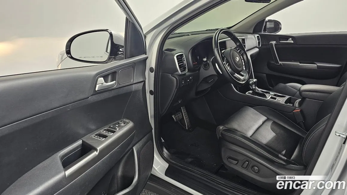 Kia Sportage — фото 10