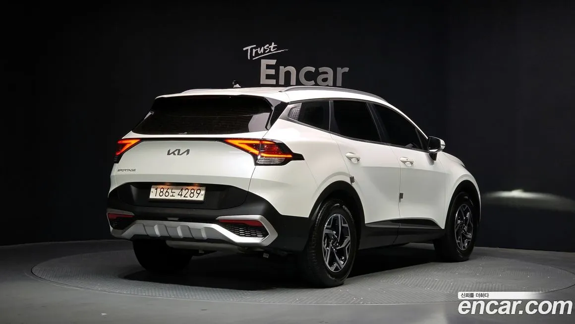 Kia Sportage — фото 10