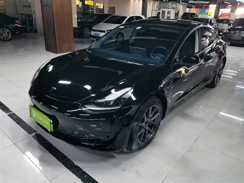 Tesla Model 3 — фото 9