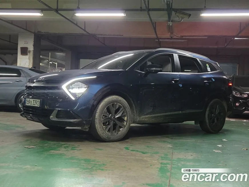 Kia Sportage — фото 1