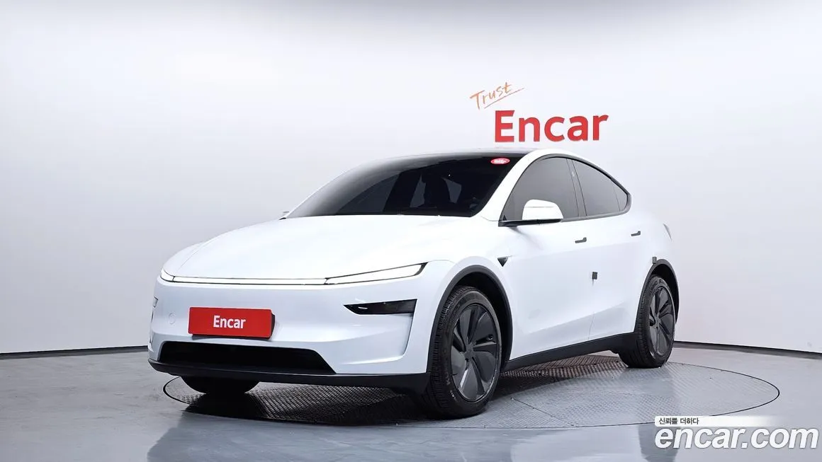 Tesla Model Y — фото 1