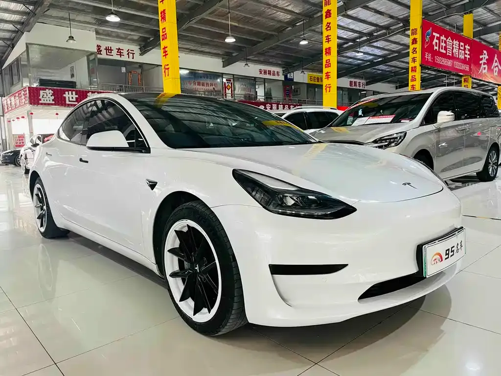 Tesla Model 3 — фото 10