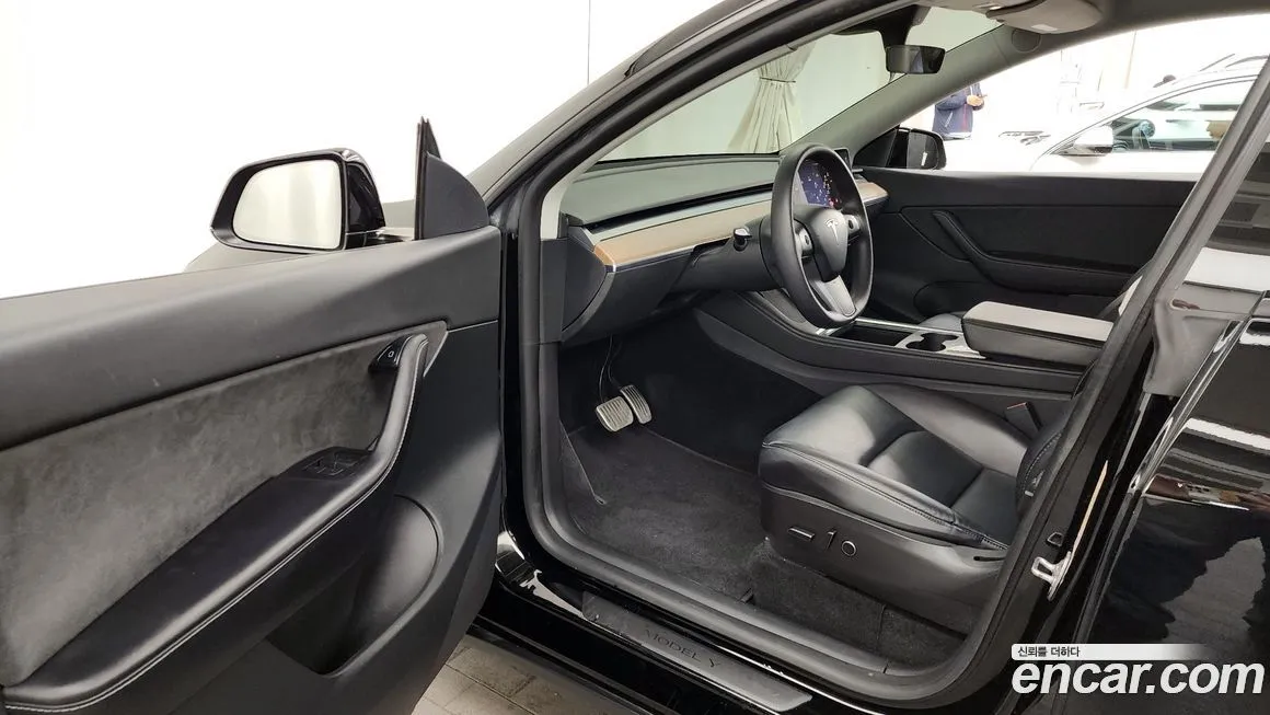 Tesla Model Y — фото 5