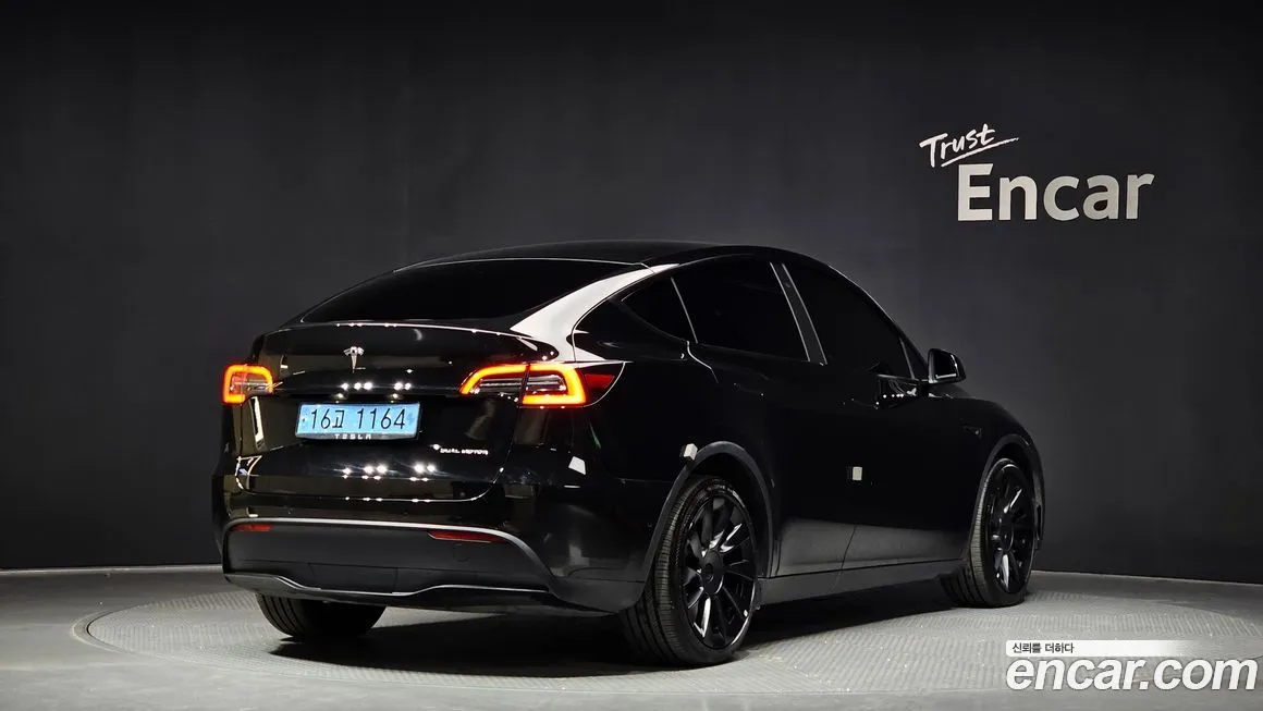 Tesla Model Y — фото 7