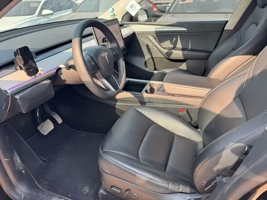 Tesla Model Y — фото 5