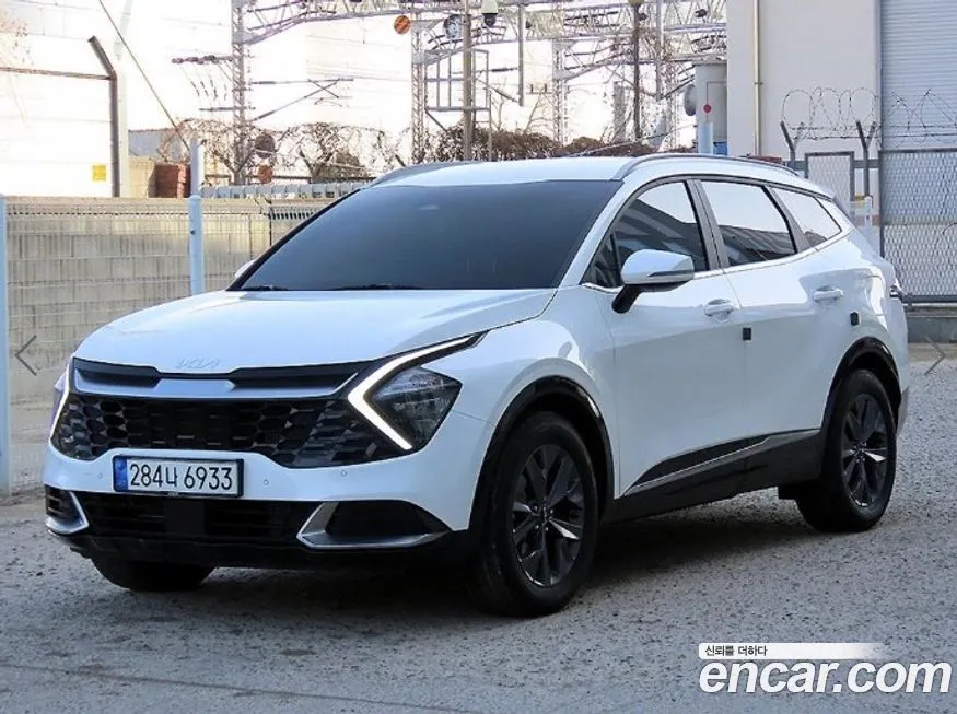Kia Sportage — фото 1
