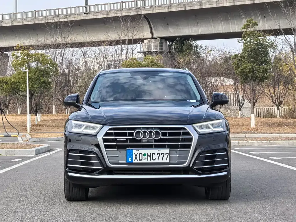 Audi Q5L — фото 5