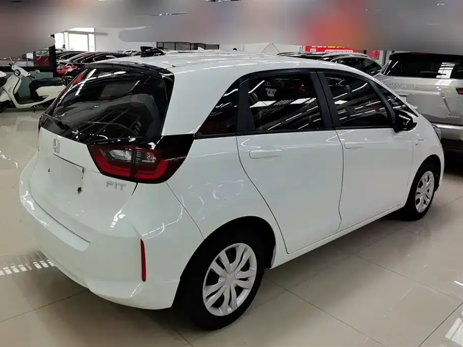 Honda Fit — фото 10