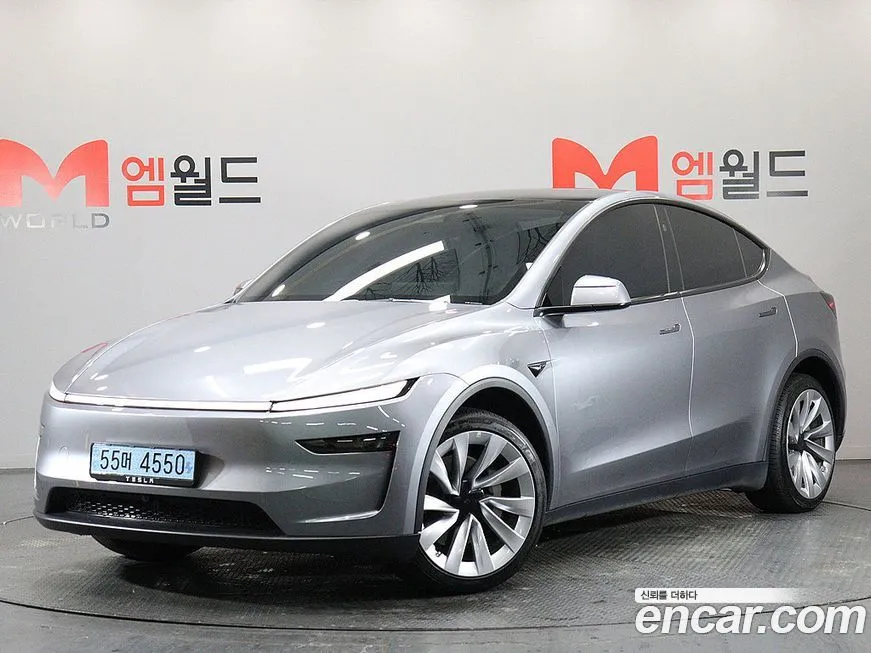 Tesla Model Y — фото 1