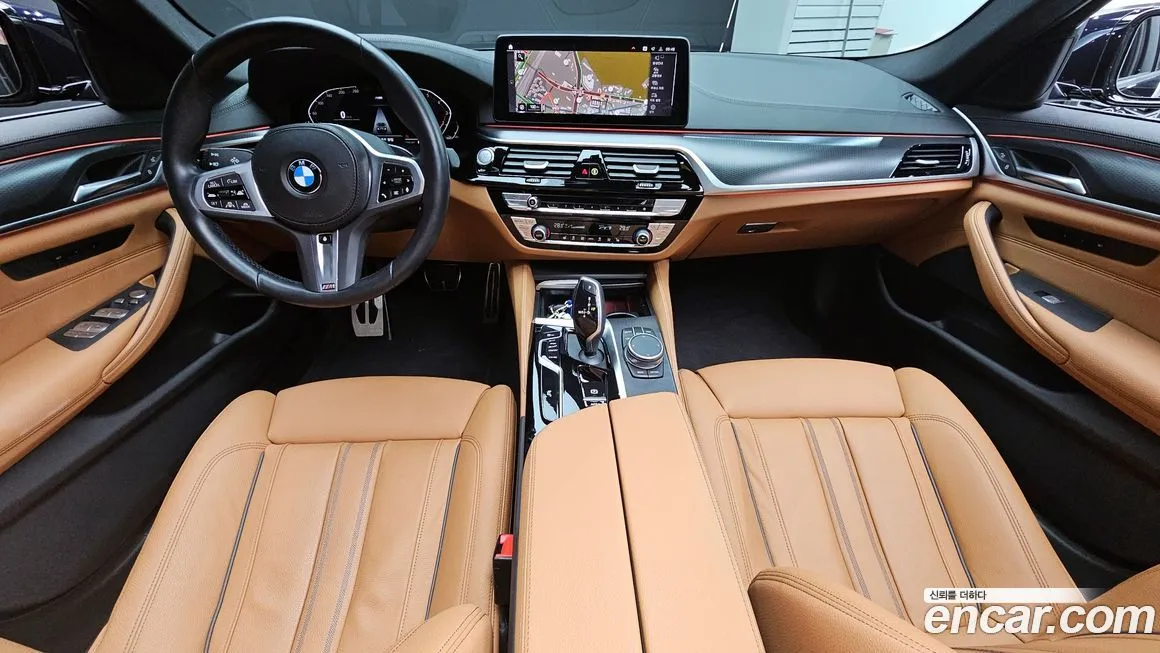 BMW 5-Series — фото 10