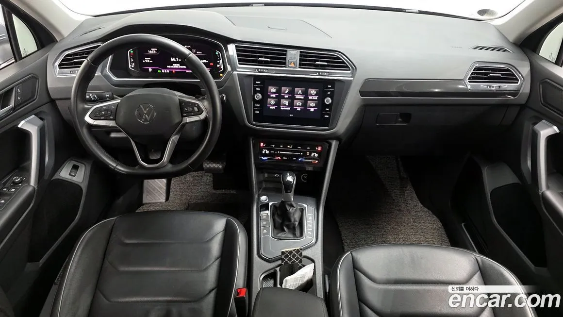 Volkswagen Tiguan — фото 7