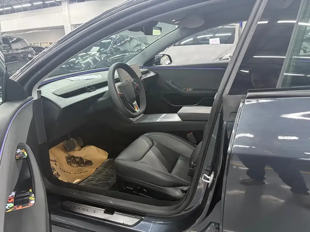 Tesla Model 3 — фото 10