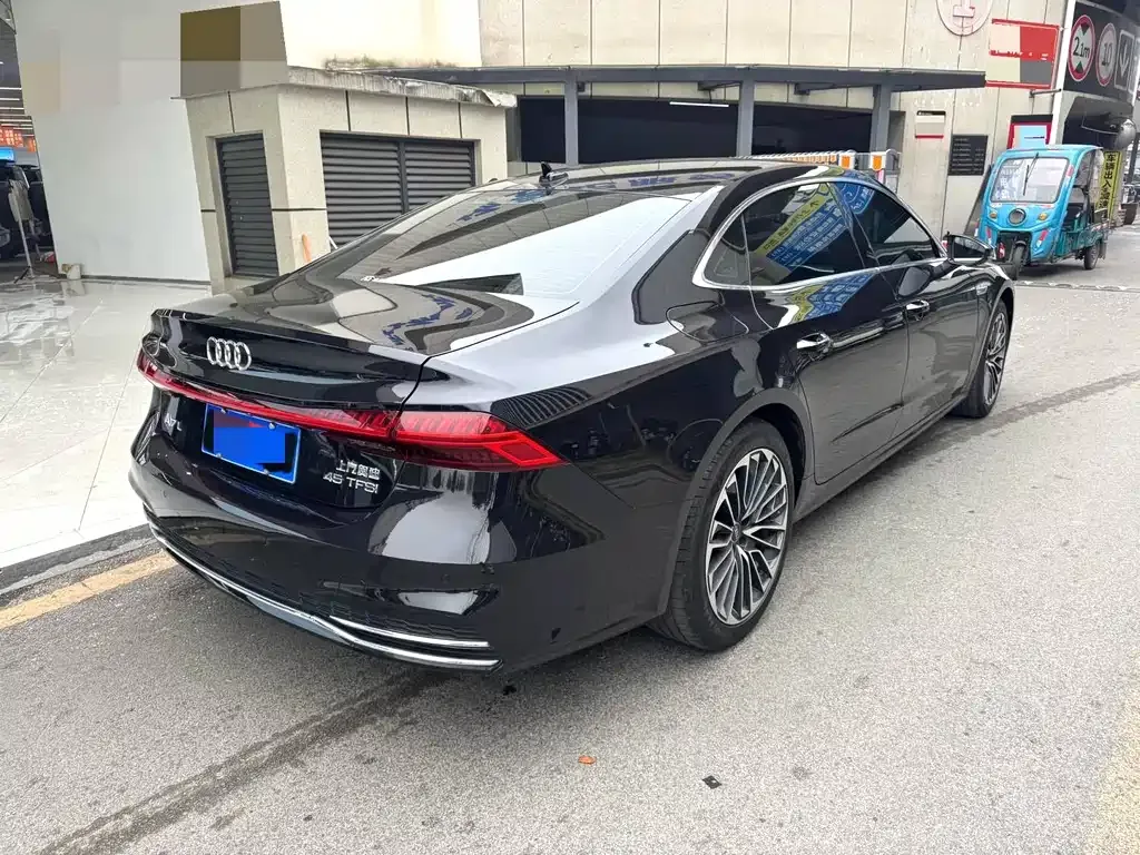 Audi A7L — фото 9