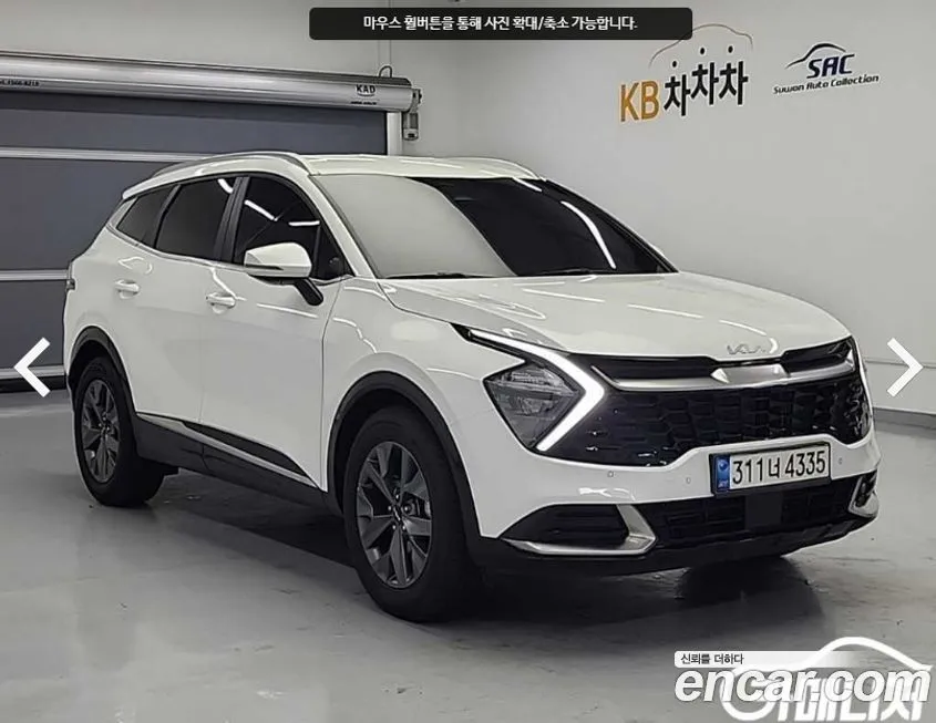 Kia Sportage — фото 1
