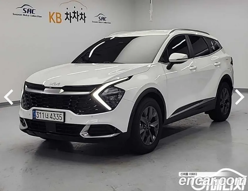 Kia Sportage — фото 7