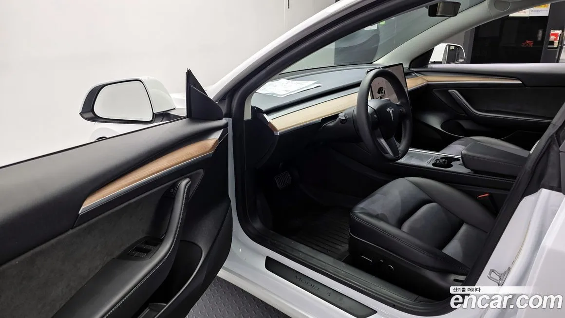 Tesla Model 3 — фото 8