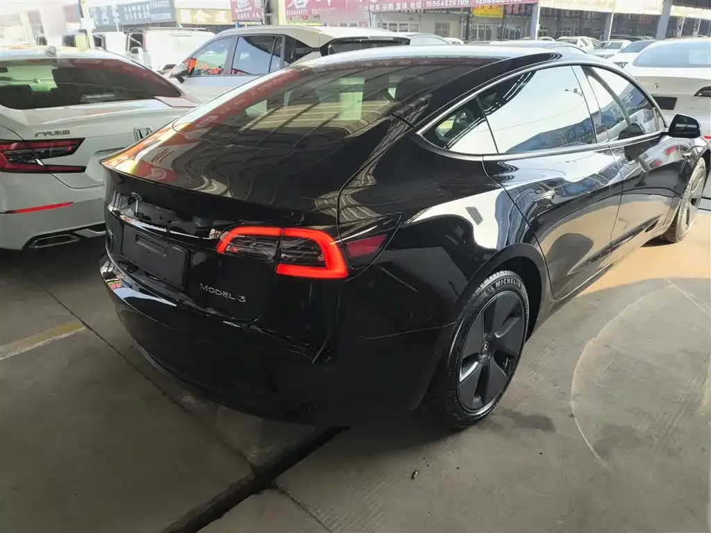 Tesla Model 3 — фото 10