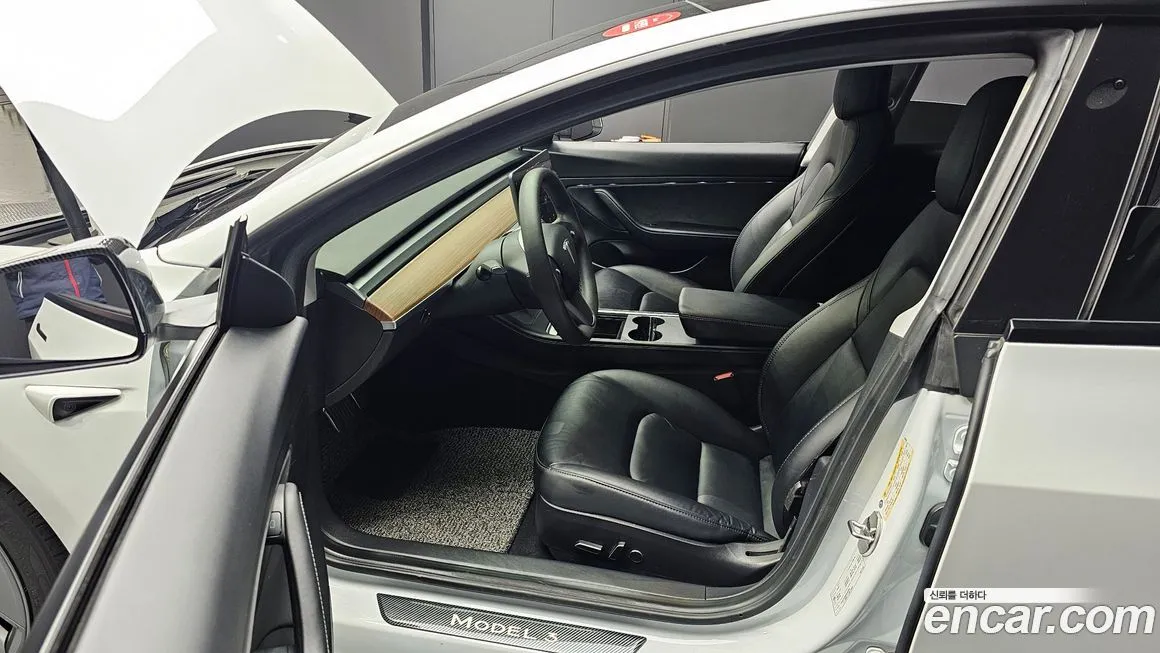Tesla Model 3 — фото 10