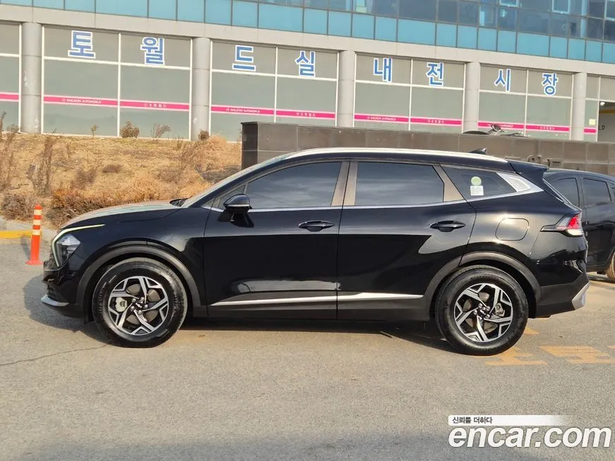 Kia Sportage — фото 8