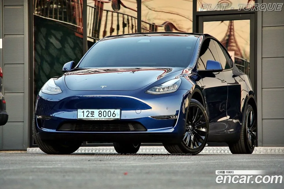 Tesla Model Y — фото 1
