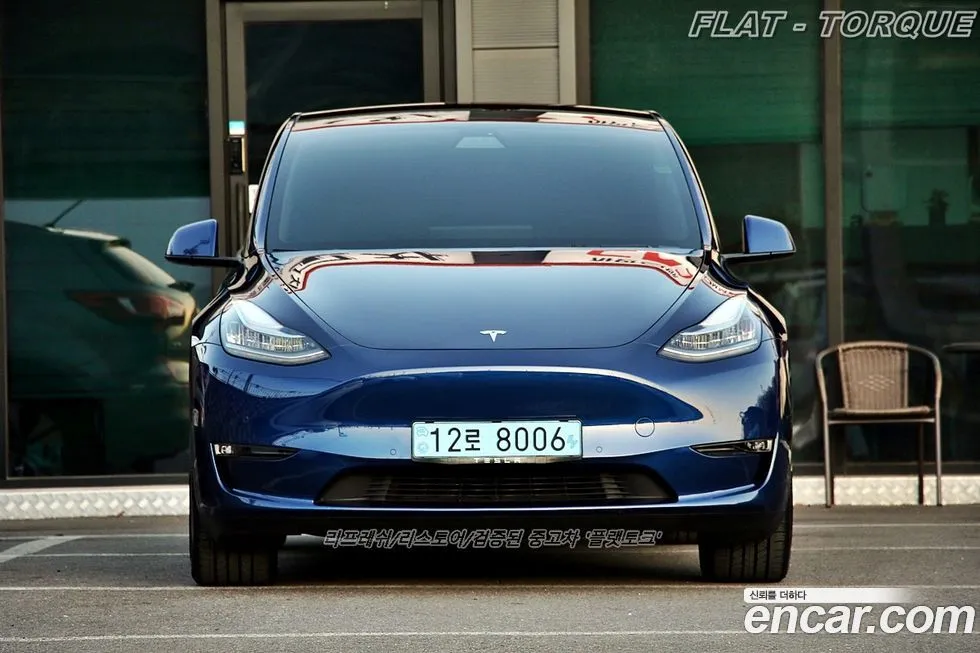 Tesla Model Y — фото 9