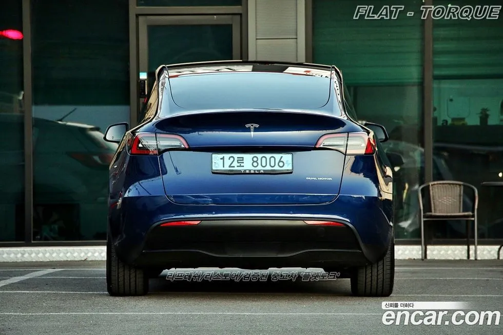 Tesla Model Y — фото 6