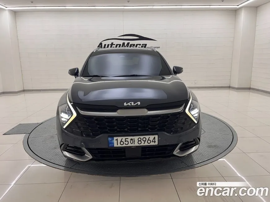 Kia Sportage — фото 1