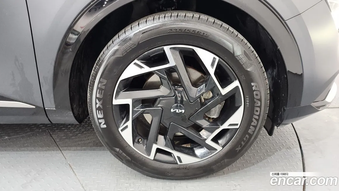 Kia Sportage — фото 10