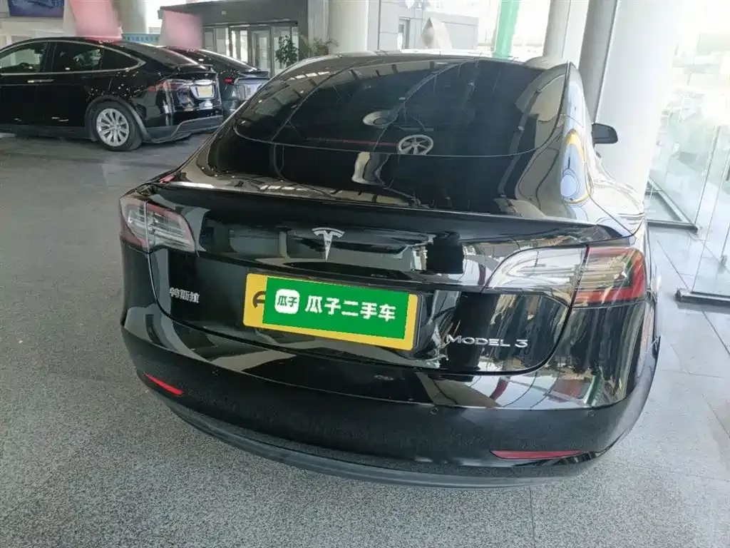 Tesla Model 3 — фото 10