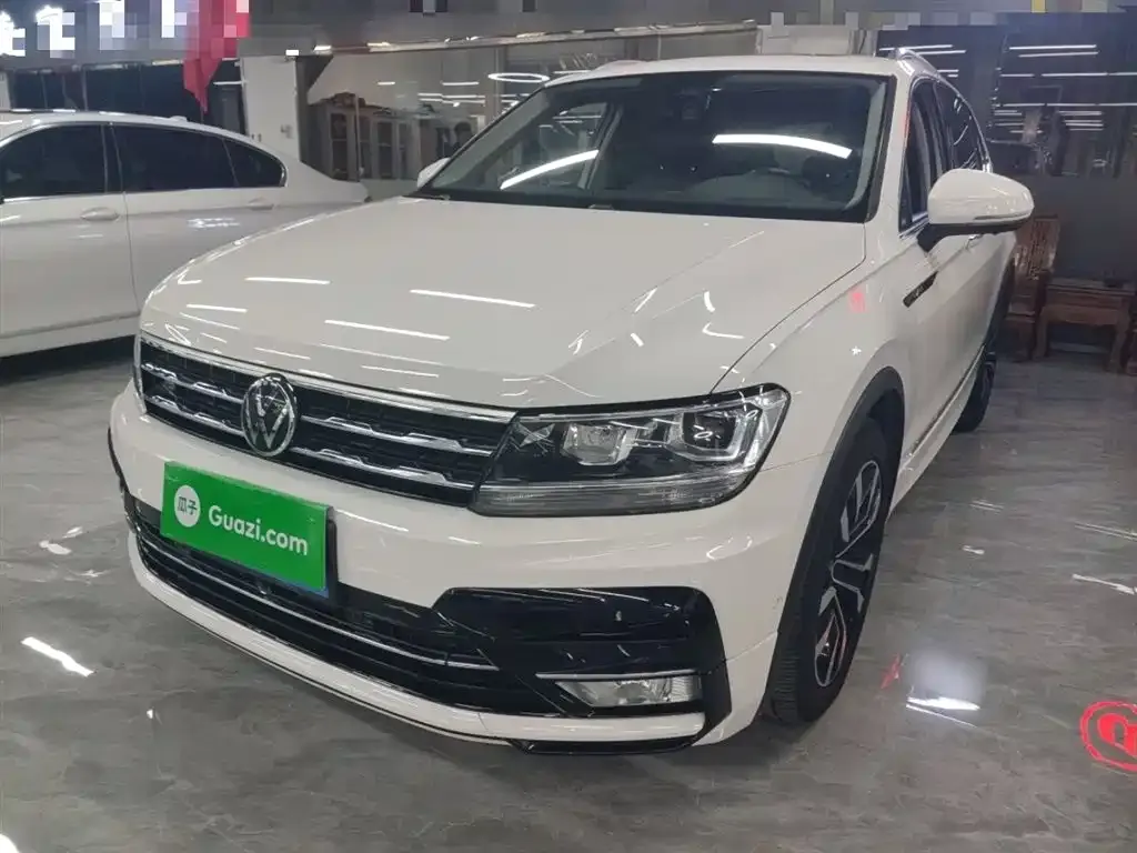 Volkswagen Tiguan L — фото 2