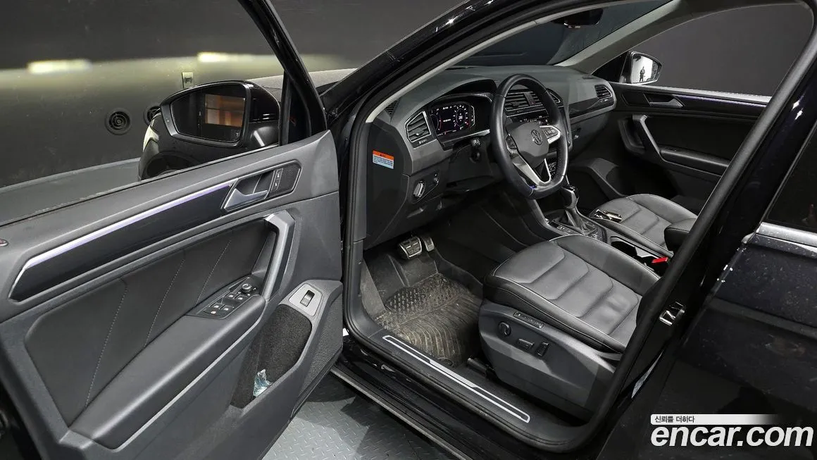 Volkswagen Tiguan — фото 10