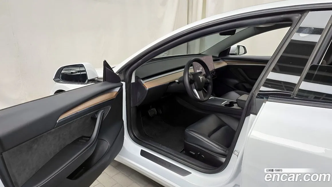 Tesla Model 3 — фото 4