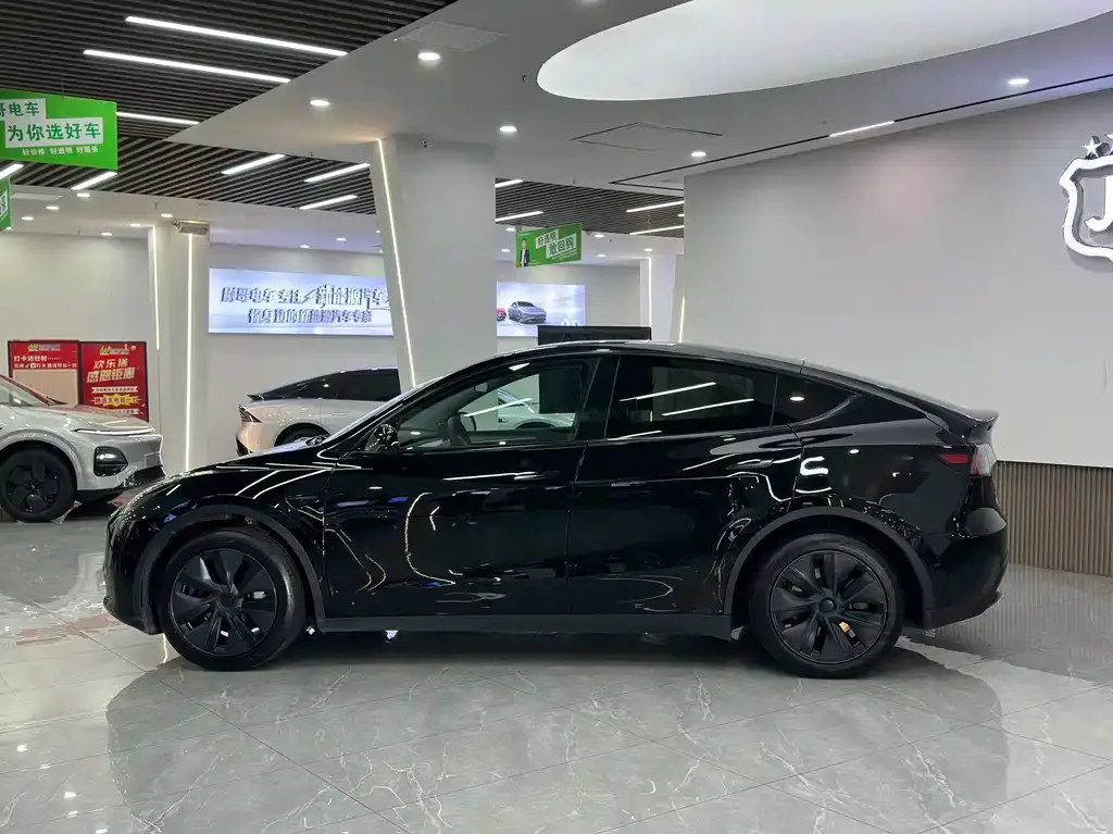 Tesla Model Y — фото 7
